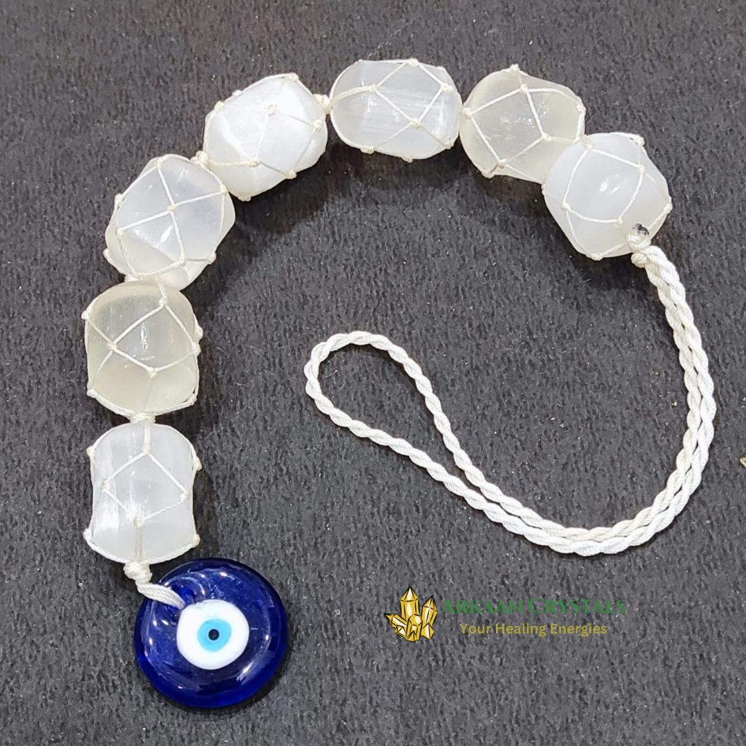 Selenite Tumble With Evil Eye Hanging